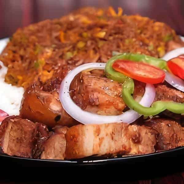 Jollof Rice and Half Portion of Pork image